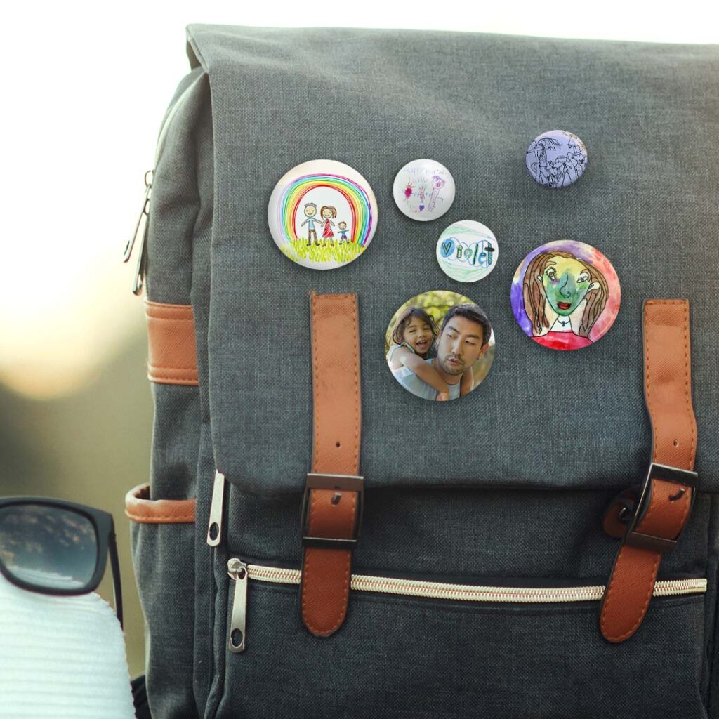 Selection of personalised pin badges on a backpack
