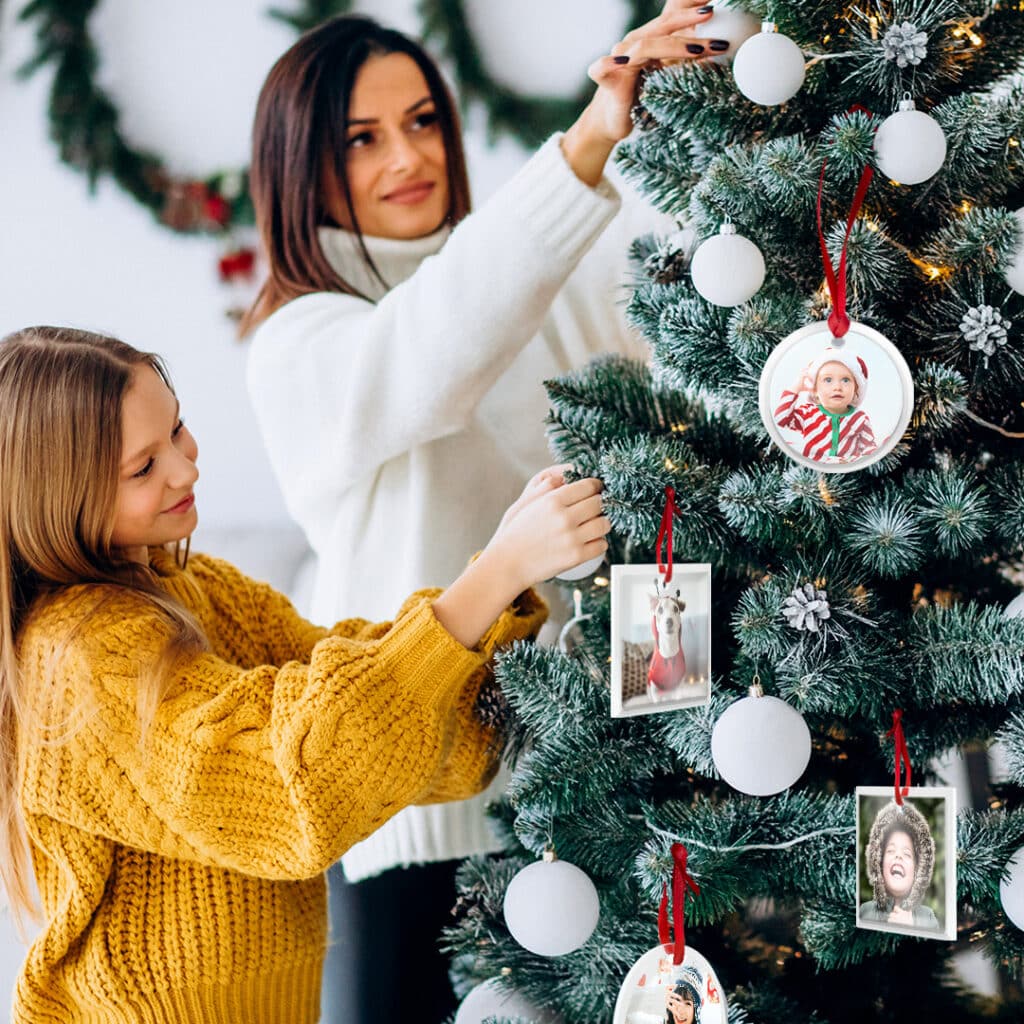 Woman and child hanging Glass Ornaments