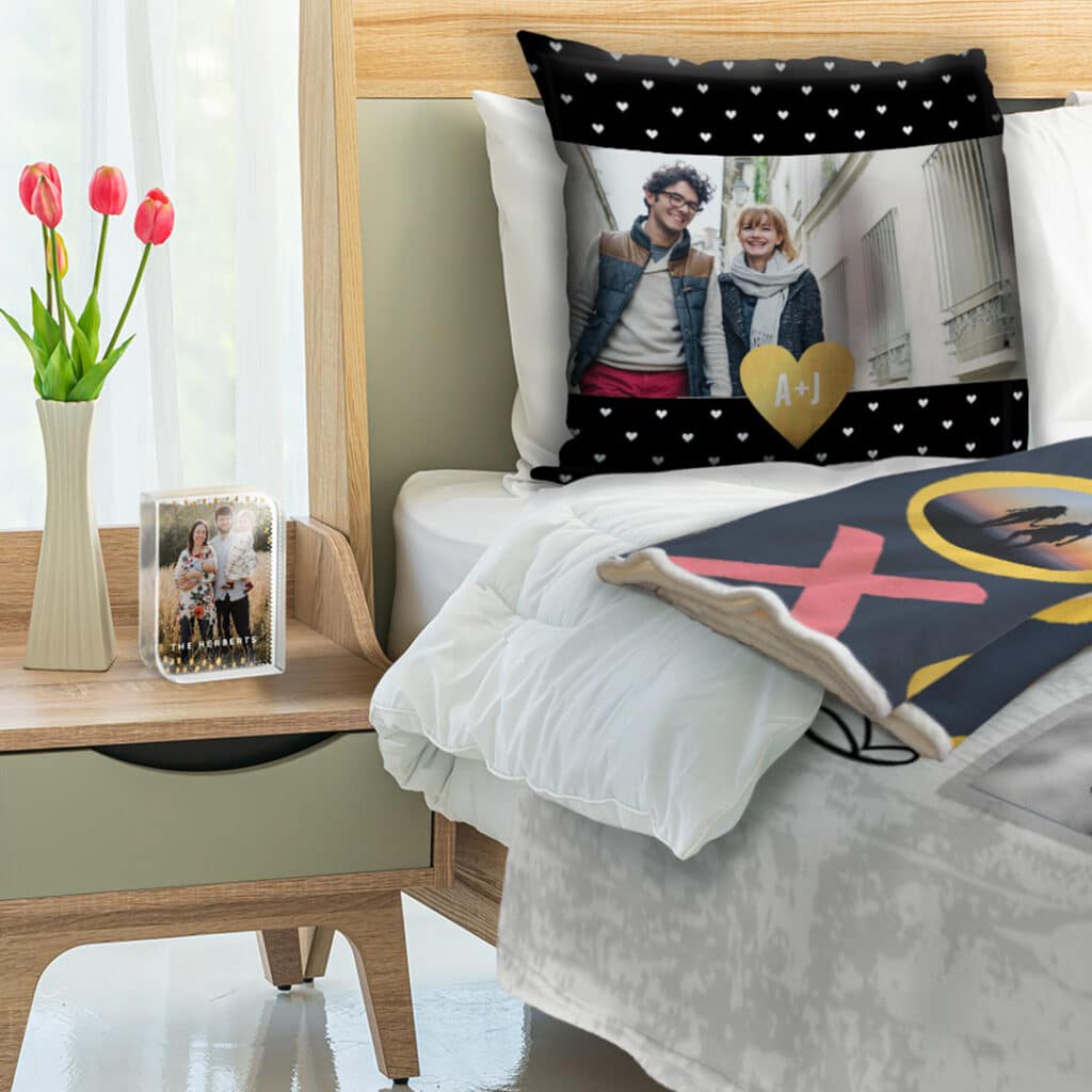 Personalised photo gifts on a bed